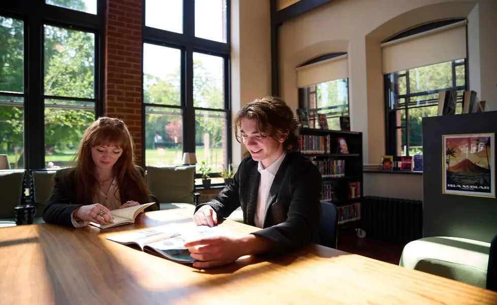 Students studying in library